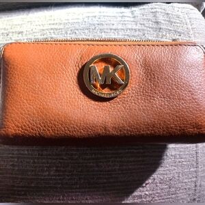 Michael Kors Brown Wallet with Textured Leather and Gold Logo